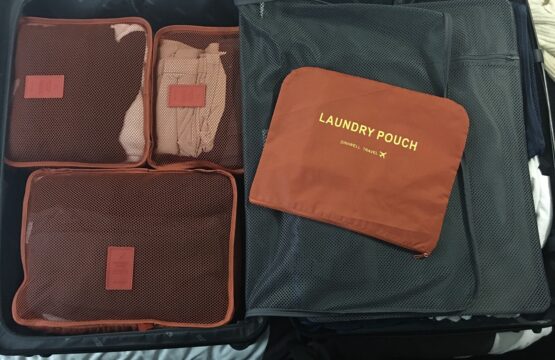 An opened luggage with packing cubes
